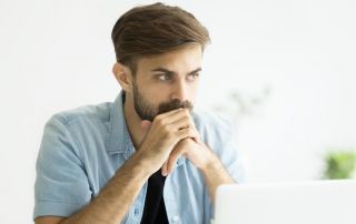 goodcenter-OCD-and-the-Drive-for-Success---Is-Residential-Treatment-the-Answer-photo-of-Thoughtful-serious-young-man-lost-in-thoughts