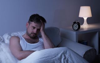 goodencenter-Sleep-and-Mental-Health-photo-of-a-man-suffering-from-sleeplessness