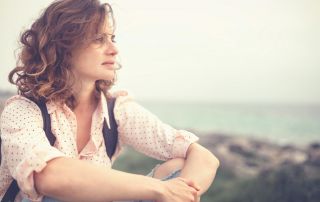 goodencenter-How-Do-I-Know-If-I-Am-Bipolar-photo-of-a-thoughtful-woman-near-the-beach