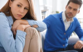 goodencenter-How-to-Help-Someone-Who-Is-in-Denial-of-Their-Mental-Illness-photo-of-young-couple-waiting-for-psychology-session-family-problems